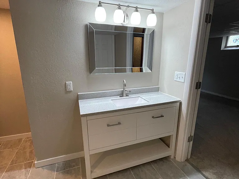 Modern sink & cabinet lower level bath