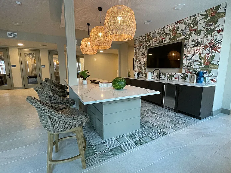 Experience the blend of style and functionality in this modern kitchen space.
