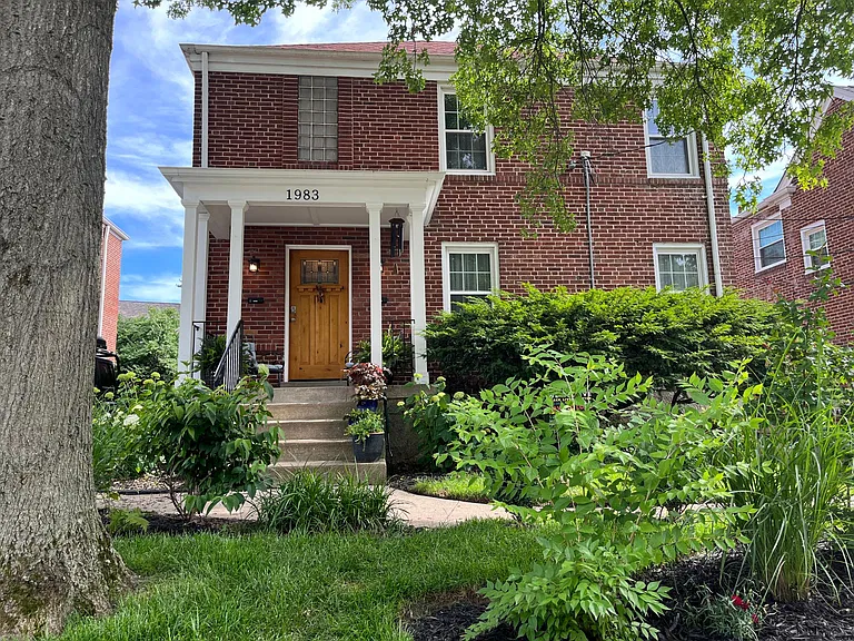 Front of building with covered porch. Building has two apartments and basement laundry. There is no backyard and no parking in the back of the house with plenty of street parking in front.
