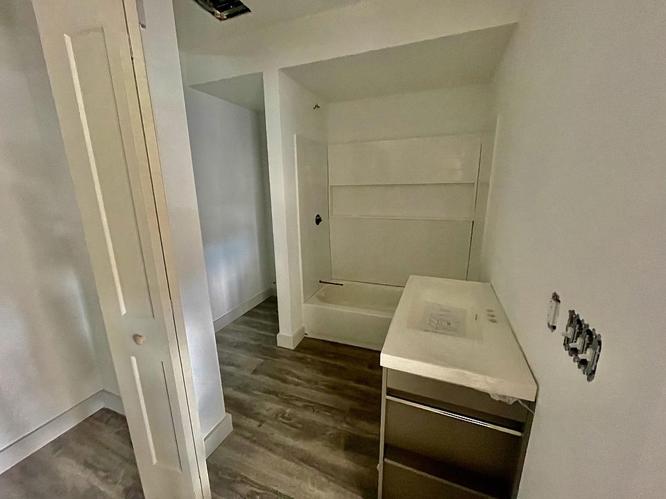 2 bedroom unit bathroom. Full tub, niche for toilet, washing machine and drier will be in closet.