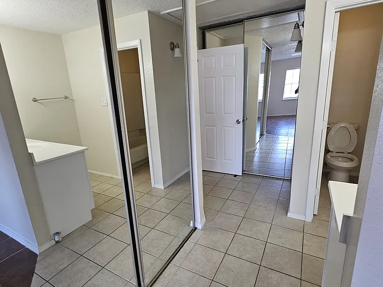 Upstairs glass door closets