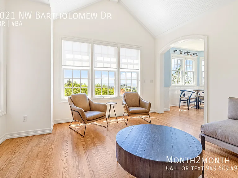 9021 NW Bartholomew Dr — Photo 31