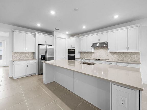Chef-inspired kitchen with designer finishes