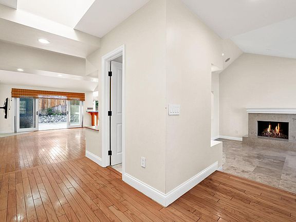Formal living room with fireplace.
