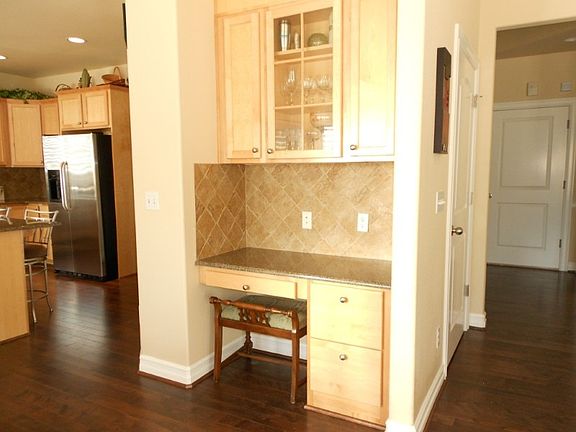 Built in desk in kitchen area.