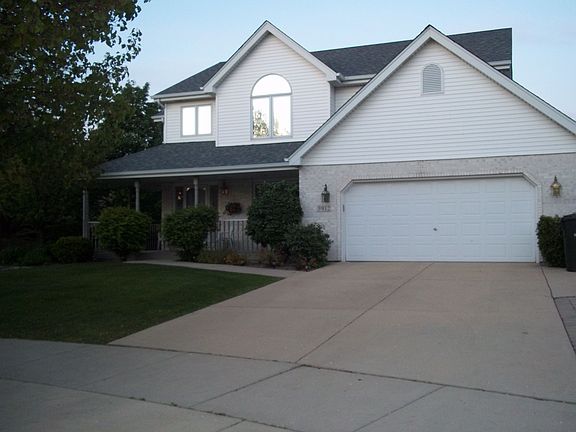 front view with wrap-around porch