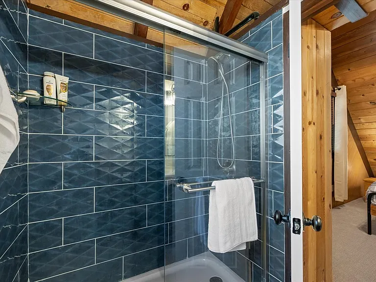 Remodeled on suite bathroom with walk in shower.