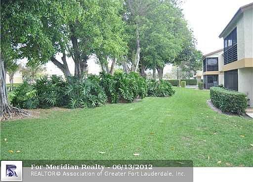 1st image of 616 Gardens Dr APT 104