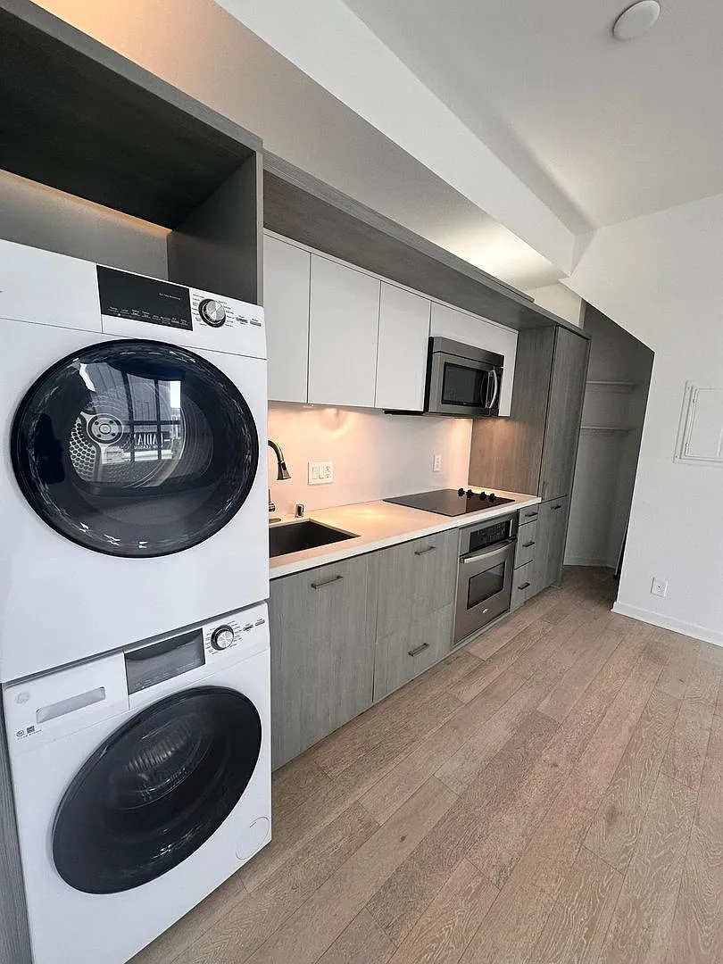 Downtown Gem | Modern Two-Level Loft With Private Patio & Rooftop Deck — Photo 4