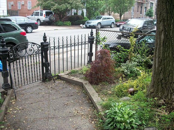 Front walk leading to sidewalk