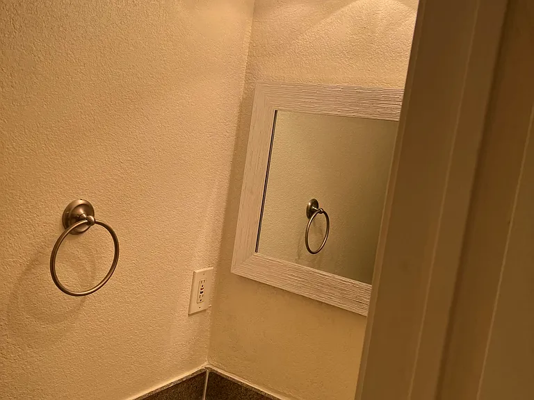 Small powder room on the first floor next to Laundry room