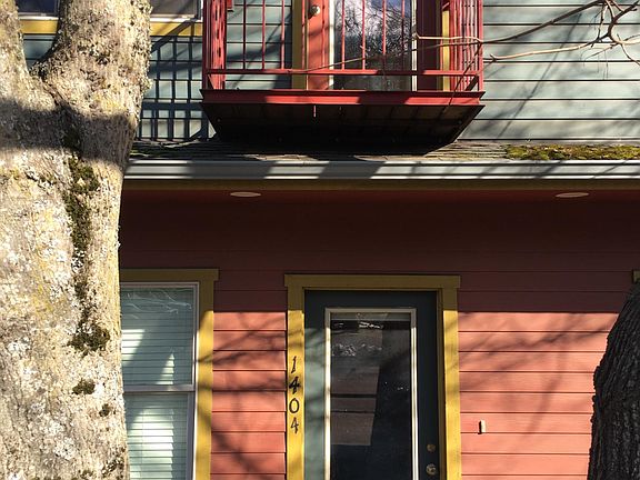 Main entry and 2nd floor balcony