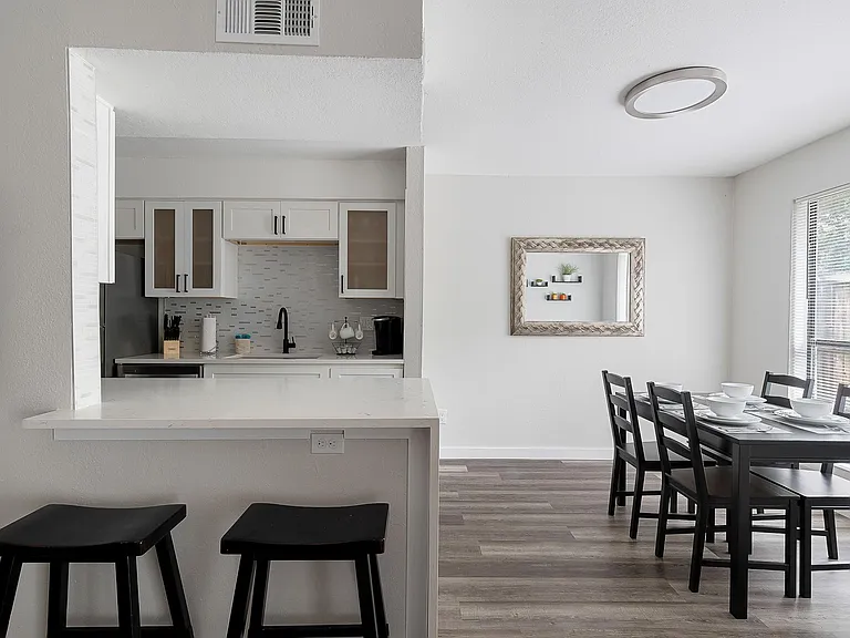 Kitchen is open to dining and living rooms