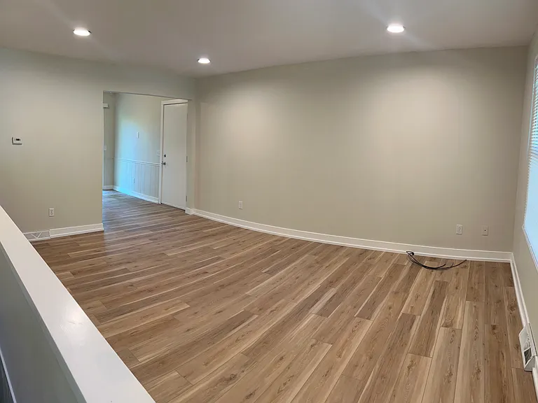 main living room/door to garage stall