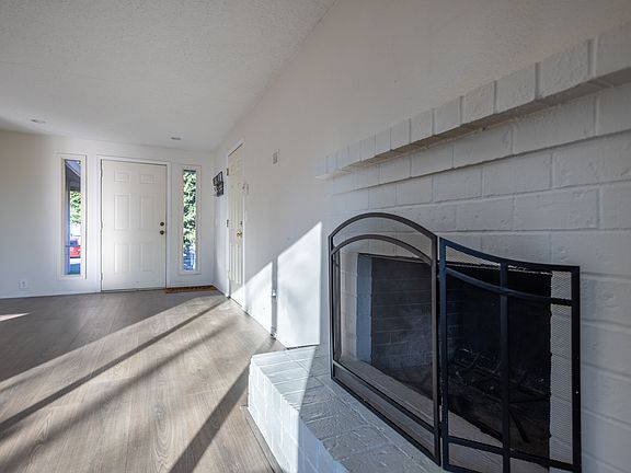 Entry, living room, and dining room get ample natural light