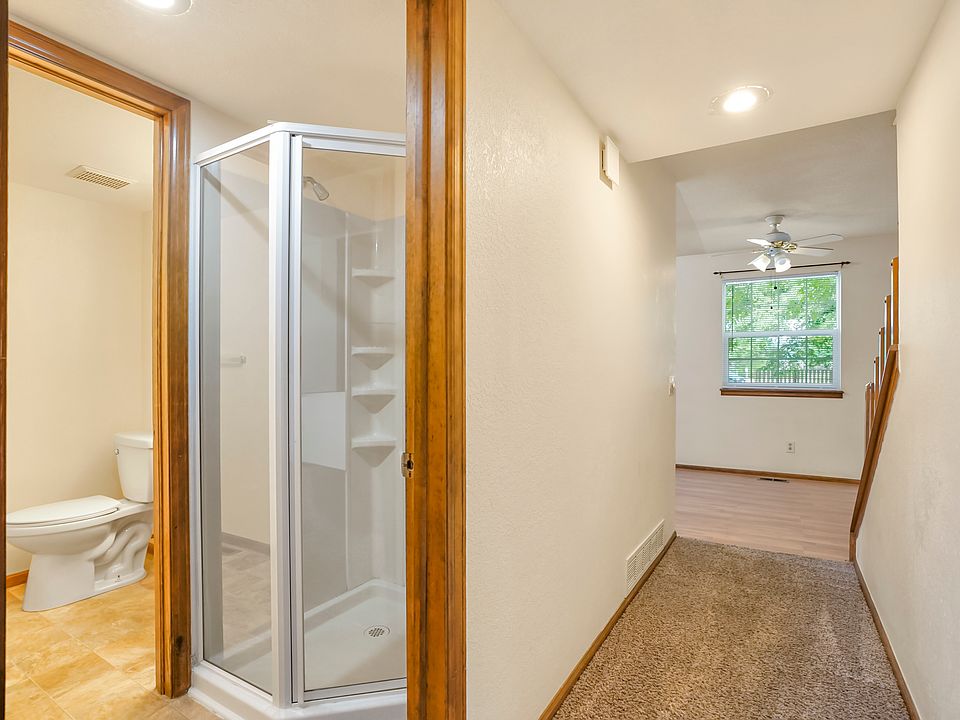 3/4 Bathroom on Main Level/Hallway to Kitchen and Dinning Room