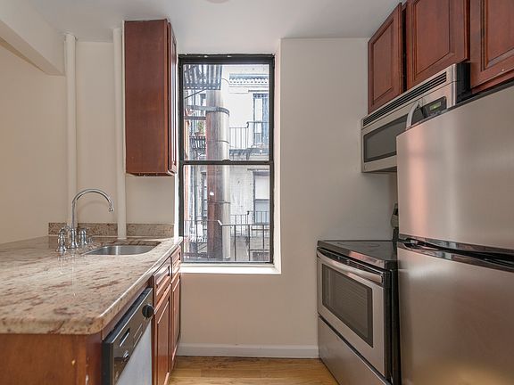 3rd image of 128 E 4th St APT 6