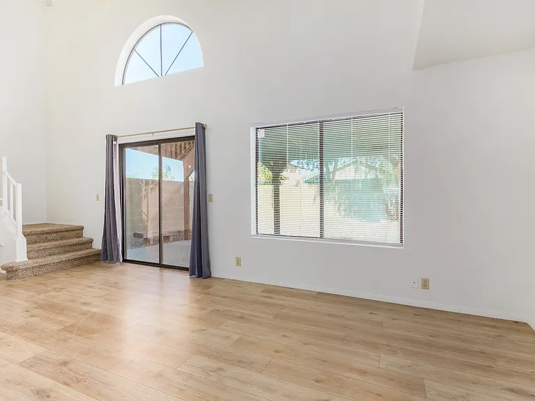 Lofted Main Living Area. New paint, flooring and fan.