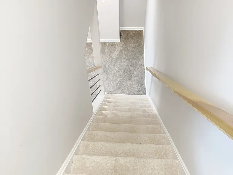 Stairs to finished basement (access from dining room area)