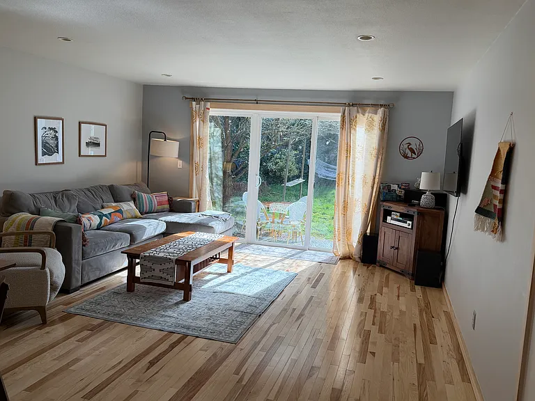 Comfortable, open floor plan. Brand new Hickory hardwood floors throughout entire house and in back office. OLED television included in rental, along with comfy crate and barrel sectional sofa; rest of furniture pictured.