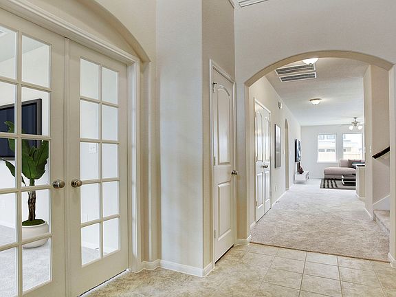 Home office tucked off foyer
