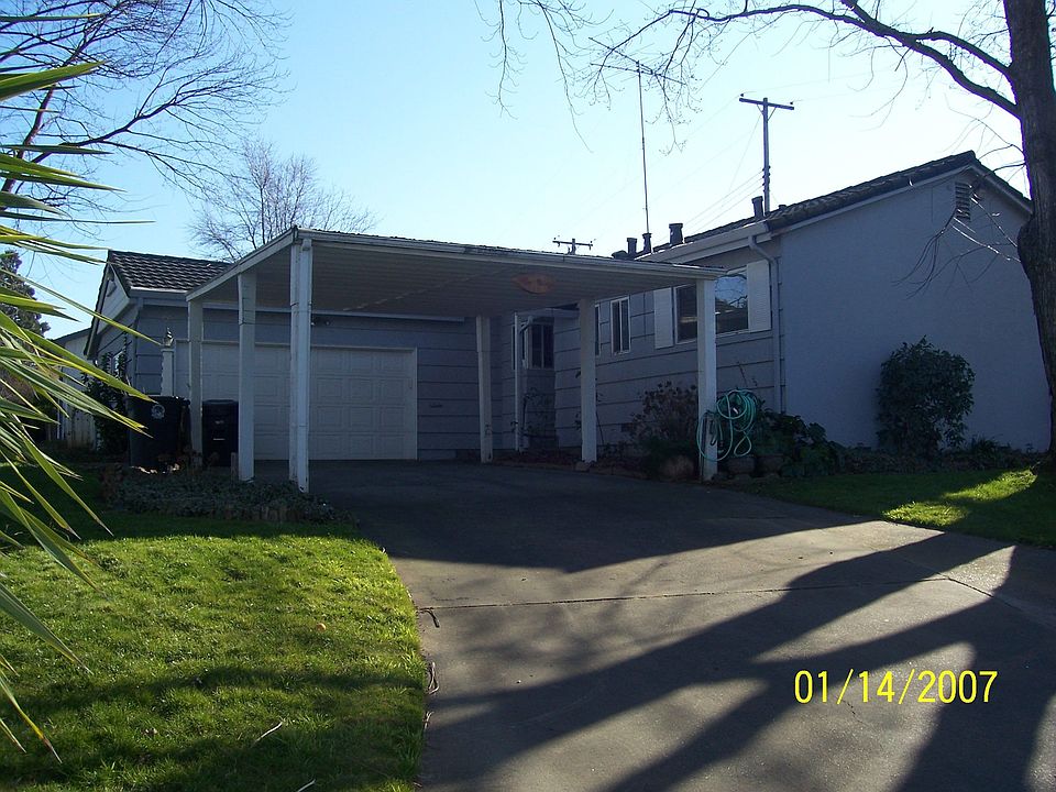 Home sit on top of large corner lot.