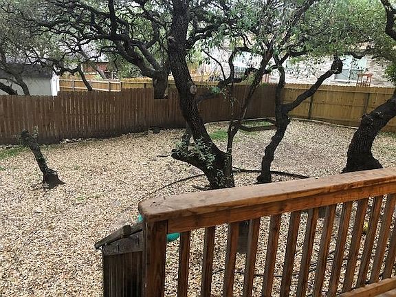 View of the backyard from the covered patio. Yes, there is plenty of shade.