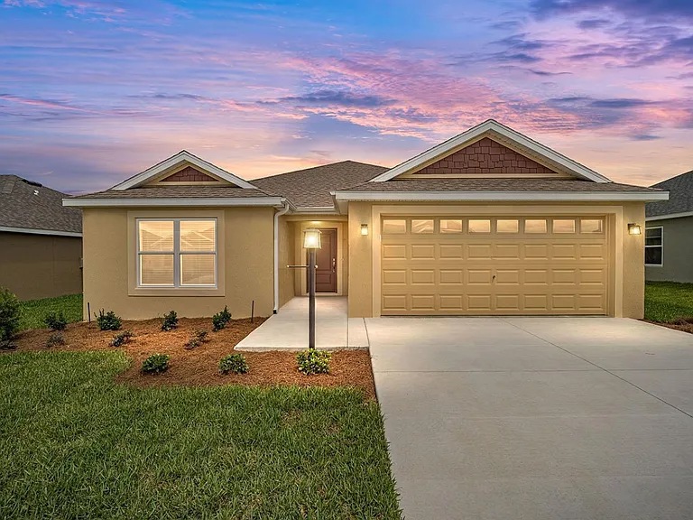 Front View of the House and Driveway during a Lovely Sunset!