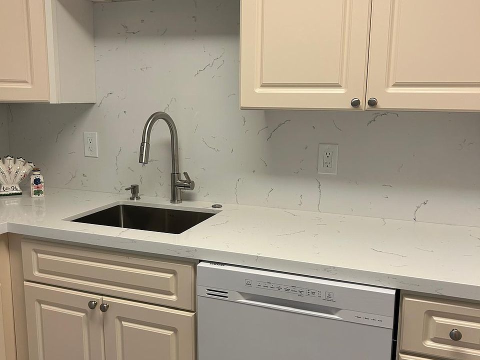 Kitchen New Quartz Counter Tops, Sink and Faucet