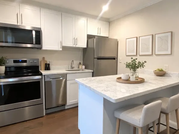 Boutique Living with Modern Upgrades - Golf View Apartments