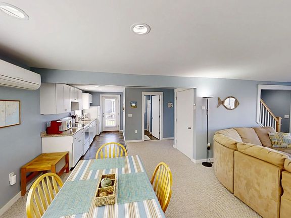 Open kitchen/ dining and living area