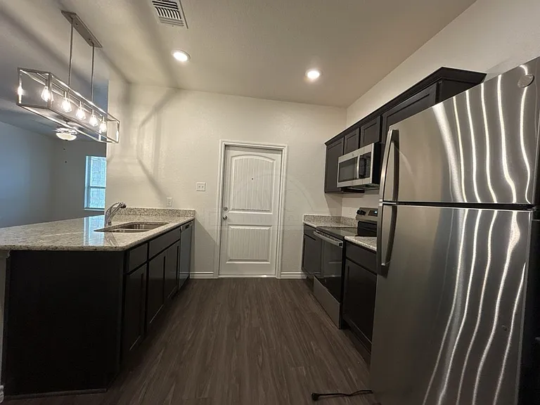 5104 Rose Garden Loop — Photo 5