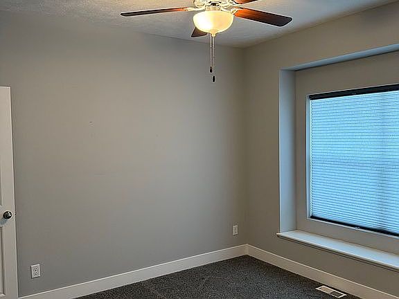 Bedroom with walk in closet