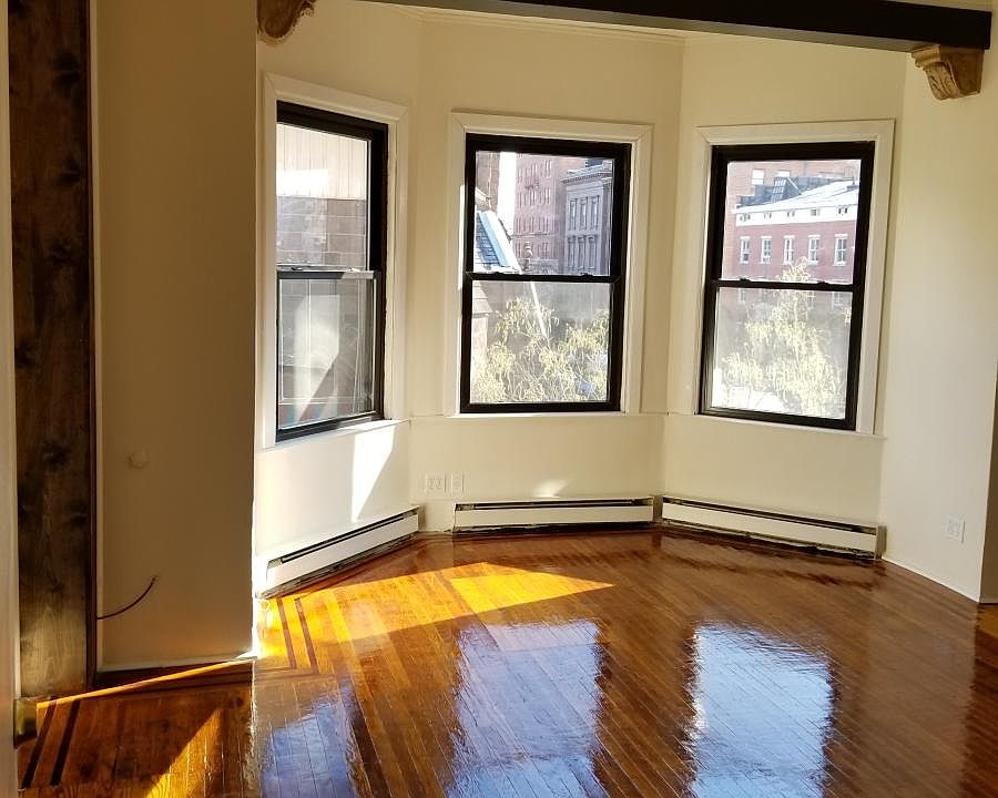 living room - check out the floors and original period trim