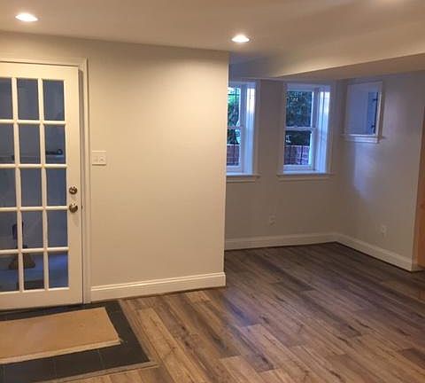 Apartment entrance and front windows