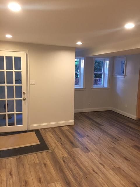Apartment entrance and front windows