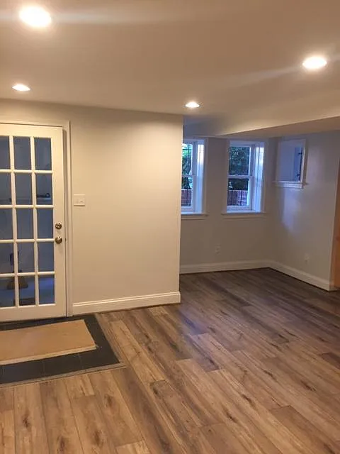 Apartment entrance and front windows