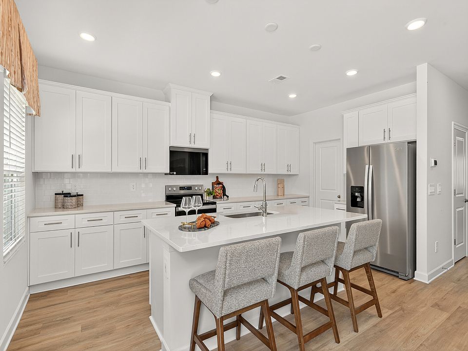 Kitchen in the Dakota floorplan at a Meritage Homes community in Charlotte, NC.