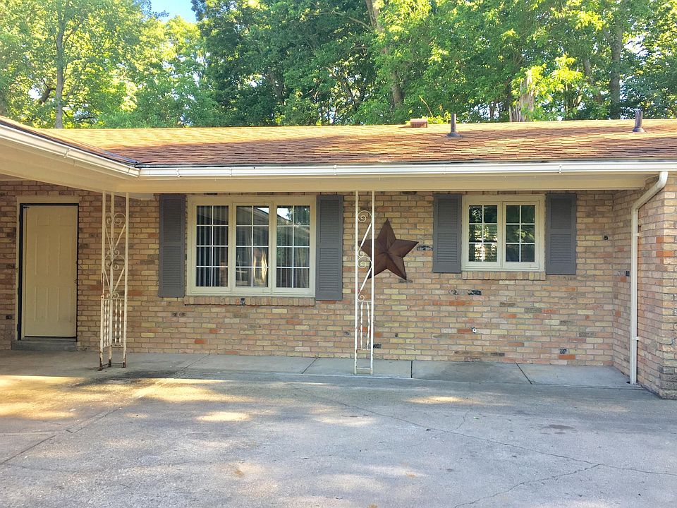 Full brick apartment with a spacious patio