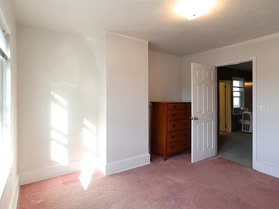 Front bedroom, one of the three bedrooms.