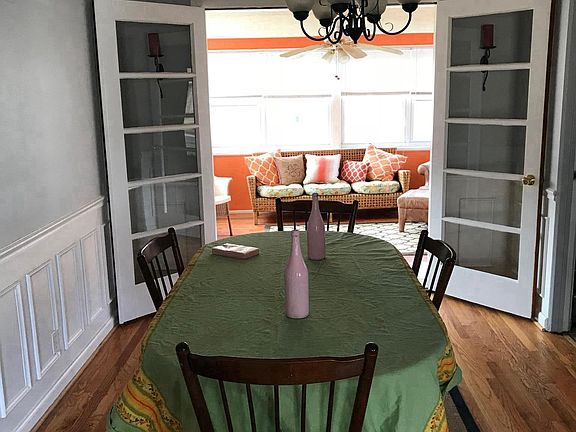 Dining Room with French Doors leading to Sunroom