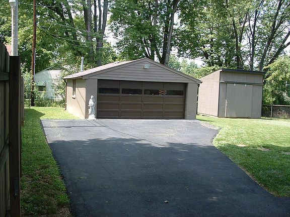 Driveway View of Backyard 