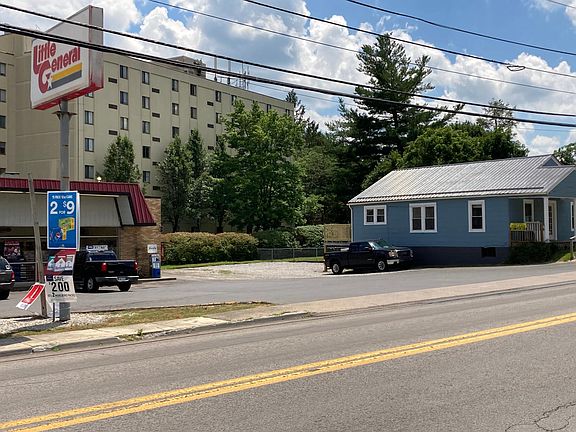 Side view with plenty of parking in back