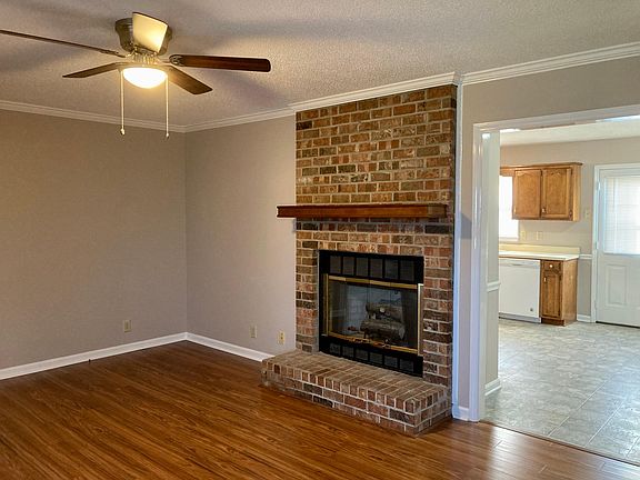 From family room walk into spacious country kitchen with LOTS of cabinet space