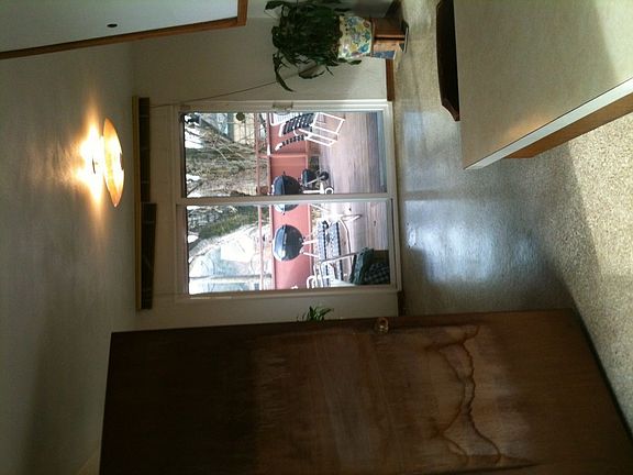 Formal dining room opens up to outdoor deck.