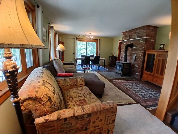 Spacious living area with sun and garden view