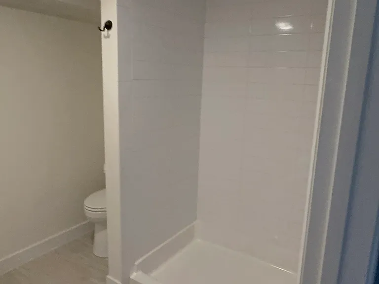Brand new bathroom 2025 basement level shared between 2nd bedroom and optional 3rd or spare space room.