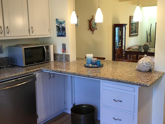clean kitchen to living and dining area.
