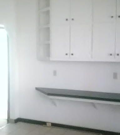 Back wall of kitchen. Lots of cabinets and counter space!