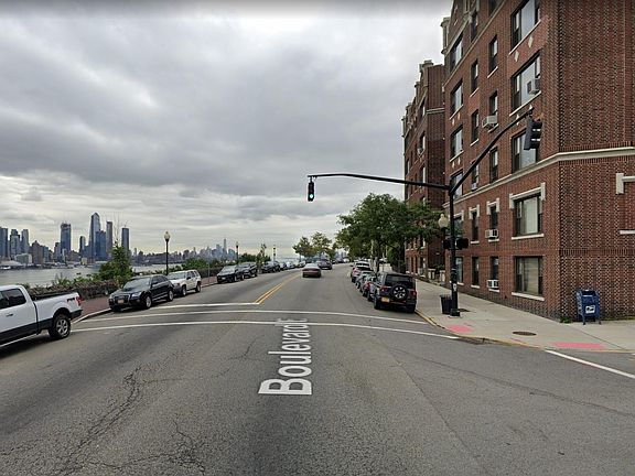 Front of the building w cityscape